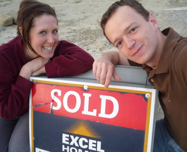 Buying our first house, sold sign