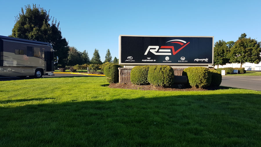Sign of the REV Group in Coburg, OR