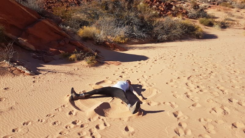 Making sand angels at Valley of Fire State Park