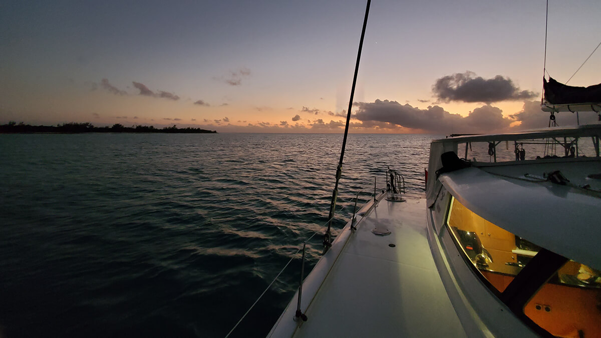 Seamlessly anchored in West Bay, New Providence Island during sunset